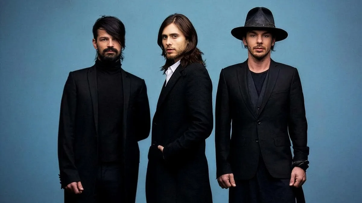 Promotional artwork for Thirty Seconds to Mars Presents A Beautiful Lie vs This Is War